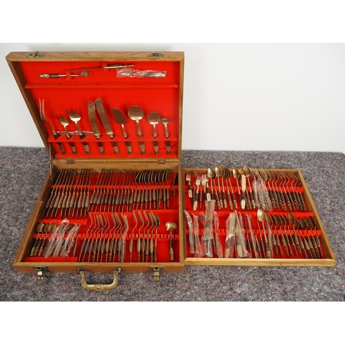 297 - Brass and wood cutlery set in box