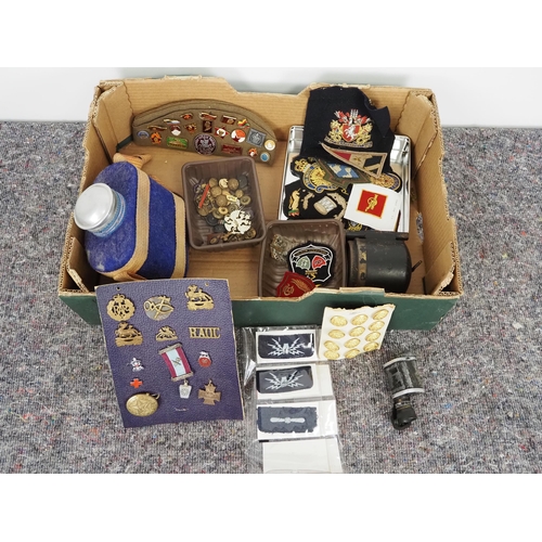 300 - Box of assorted militaria to include badges, buttons, flask, telescope, etc.