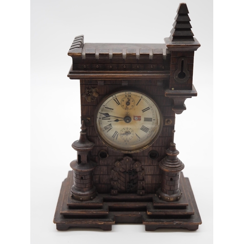 295 - German over mantle clock by Junghans in fort style oak case 10½