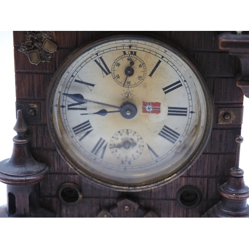 295 - German over mantle clock by Junghans in fort style oak case 10½