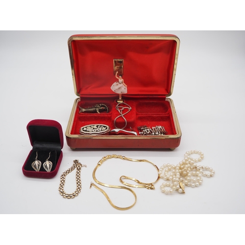 322 - Music box with assorted costume jewellery to include pearl necklace, gold bracelet, earrings, etc.