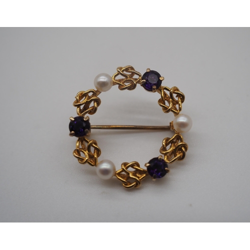 323 - 9ct Gold brooch with amethysts and pearls