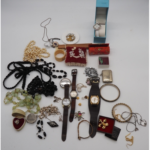 319 - Quantity of costume jewellery to include necklaces, watch, gold plated brooch, etc.