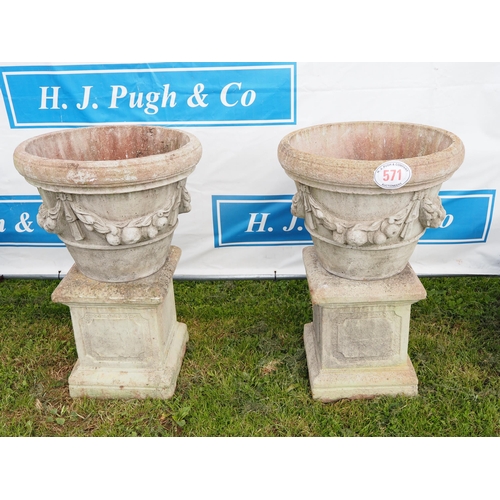 571 - Pair of planters on plinths 40