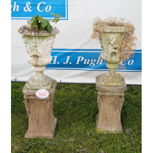 593 - Pair of handled Urns on plinths 4ft