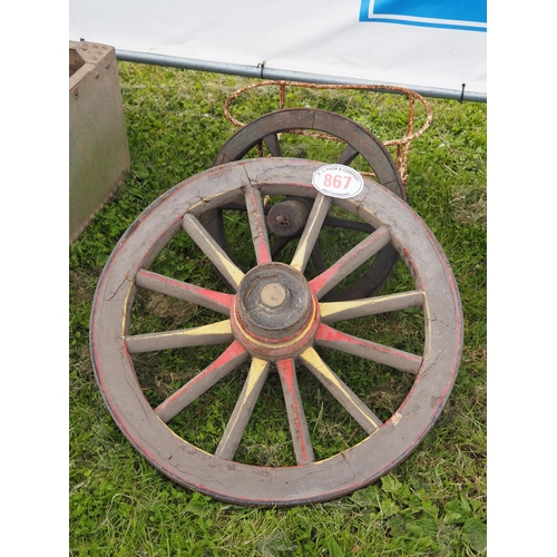 867 - Various cast iron wheels, etc.