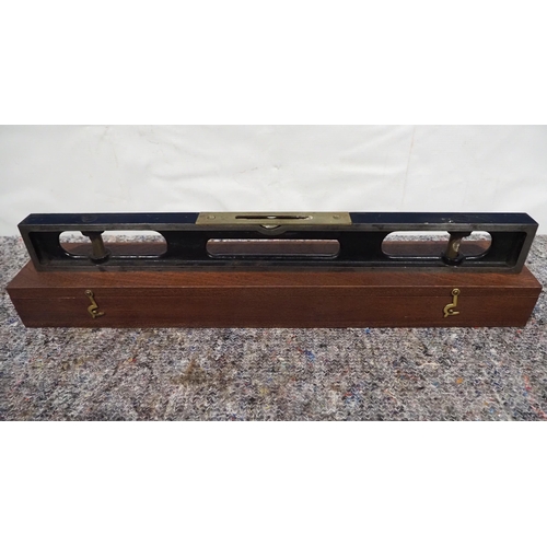 242 - Cast iron spirit level in wooden box by Rabone Chesterman