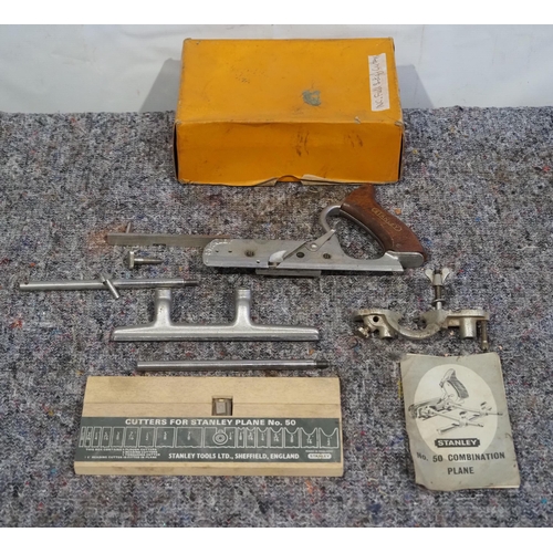 297 - Stanley 50 combination plane with 4 set of cutters.