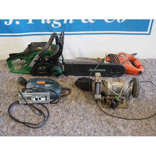 303 - Petrol chainsaw, double ended bench grinder and a black and decker jigsaw