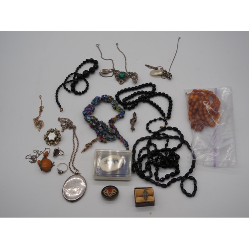 337 - Quantity of costume jewellery to include silver rings and silver locket