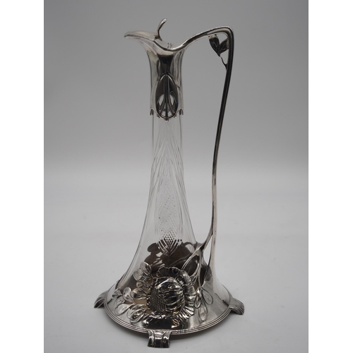 339 - Art Nouveau style wine decanter white metal and glass. Has been repaired