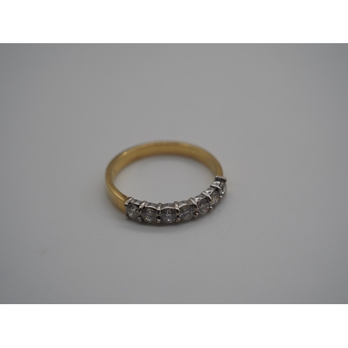 345A - 18ct Yellow/white gold 7 stone half eternity ring. All stones are 10 points. 4.5g