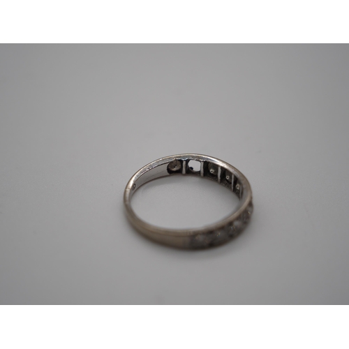 345B - 18ct White gold 9 stone graduated half eternity ring. The largest approx. 20 points. 3.5g