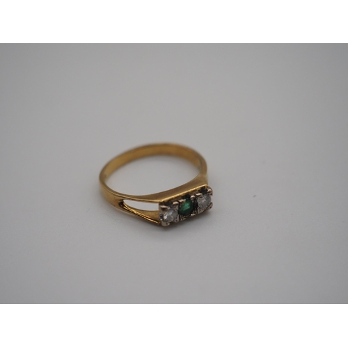 345C - 18ct Yellow gold emerald and diamond 3 stone ring. 3.6g