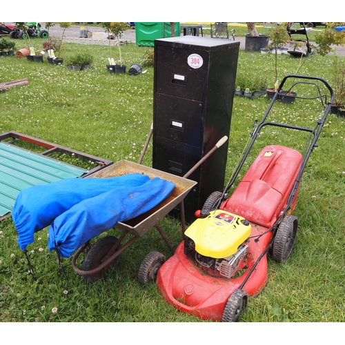 384 - Mower, wheelbarrow and filing cabinet