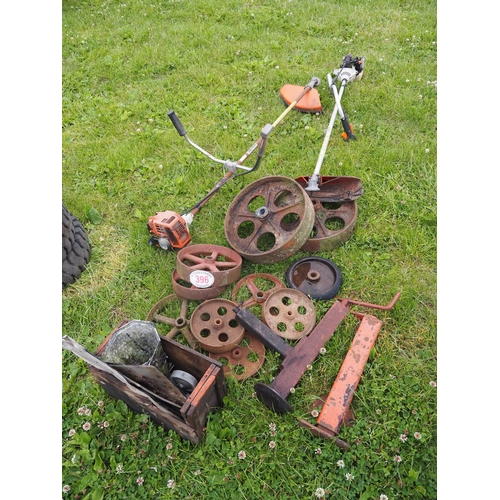 396 - Cast iron wheels, strimmers, etc.