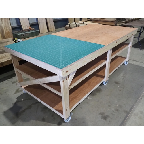 3020 - Large wooden work table with shelves on wheels 36