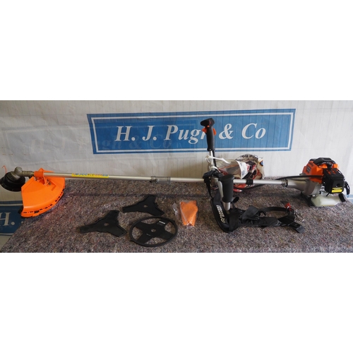 3097 - Parker petrol brushcutter with toolkit and spare blades
