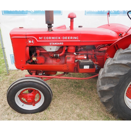 364 - McCormick Deering W4 tractor. Petrol tvo, electric start, early restoration. Reg SSL 523. Old tax di... 