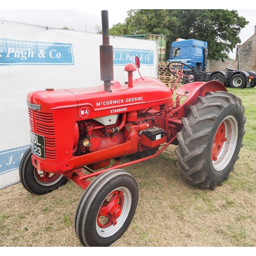 364 - McCormick Deering W4 tractor. Petrol tvo, electric start, early restoration. Reg SSL 523. Old tax di... 