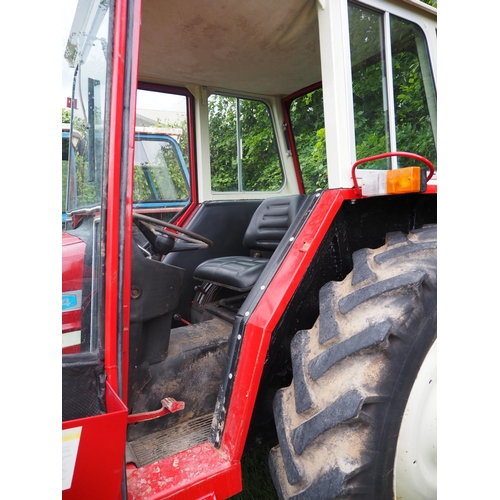 106 - International 574 tractor. Runs and drives. Fitted with pick up hitch. Showing 6985 Hours. Restored