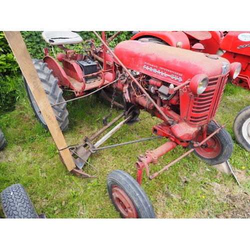 86 - McCormick International Farmall Cub tractor. Fitted with front and rear wheel weights and Mid mounte... 
