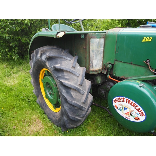 93 - SFV 302 Hot bulb tractor. Fitted with rear wheel weights. Part restored