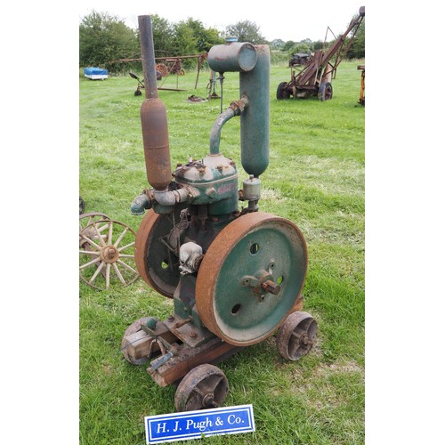 184 - Wolseley 5hp vertical engine on trolley. S/n 9085