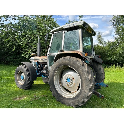 854 - Ford 7810 Silver Jubilee Series II tractor. 1989. Front fenders, Goodyear tyres.  5379 hours. Reg. G... 