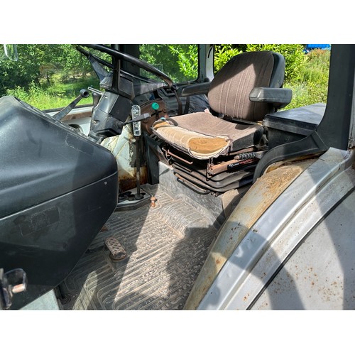 854 - Ford 7810 Silver Jubilee Series II tractor. 1989. Front fenders, Goodyear tyres.  5379 hours. Reg. G... 
