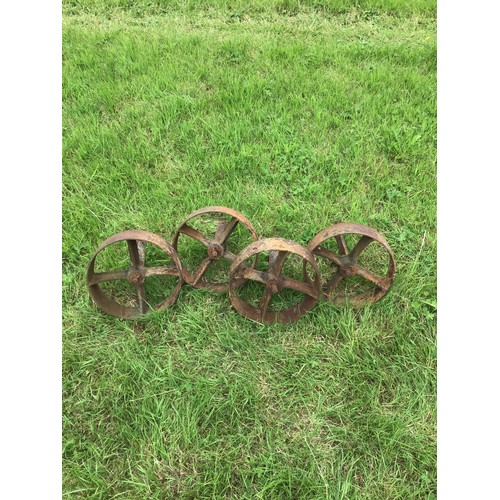 129 - Cast iron trolley wheels with spindles 12