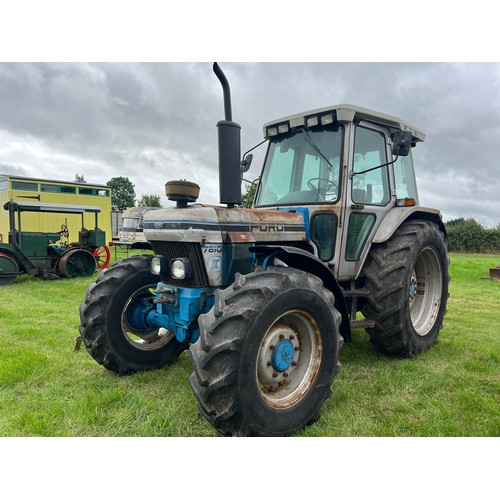 854 - Ford 7810 Silver Jubilee Series II tractor. 1989. Front fenders, Goodyear tyres.  5379 hours. Reg. G... 