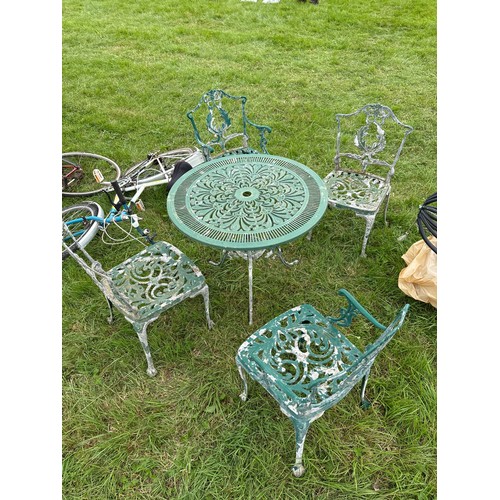 50 - Metal patio table and 4 chairs