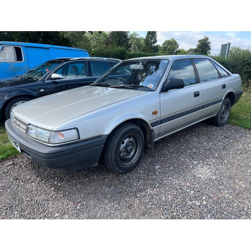 326 - Mazda 626LX, 1989. 1789cc. Petrol. Runs and drives, been in the same family for 12 years. Remote boo... 