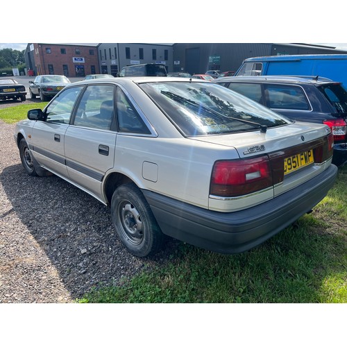 326 - Mazda 626LX, 1989. 1789cc. Petrol. Runs and drives, been in the same family for 12 years. Remote boo... 