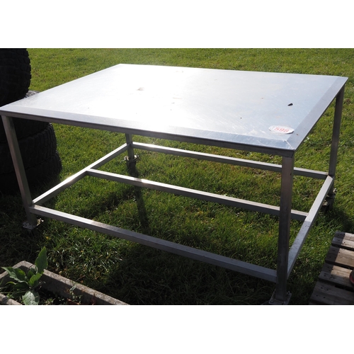 598 - Stainless steel work table on casters approx. 5 x 4ft