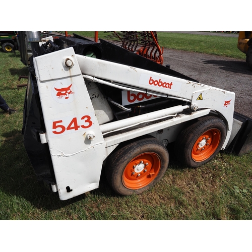 1527 - Bobcat 543 skid steer loader, engine runs. Wheel bearings need attention, slight oil leak. Sold as s... 