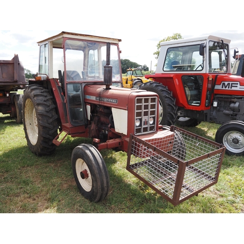 1540 - International 574 tractor. Runs and drives, showing 9213 hours. Reg. JPX 710P. V5 in office