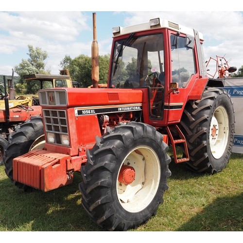 1542 - International 1056 XL 4WD tractor. Runs and drives well, showing 8247 hours, clean original tractor,... 