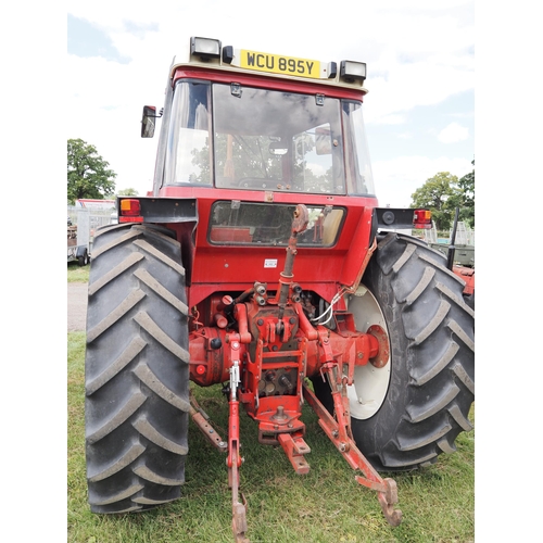 1542 - International 1056 XL 4WD tractor. Runs and drives well, showing 8247 hours, clean original tractor,... 