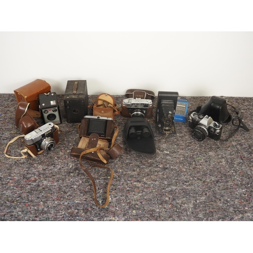 70 - Vintage cameras, binoculars, etc.