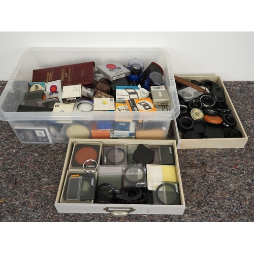 51 - Quantity of assorted camera lens covers and filters