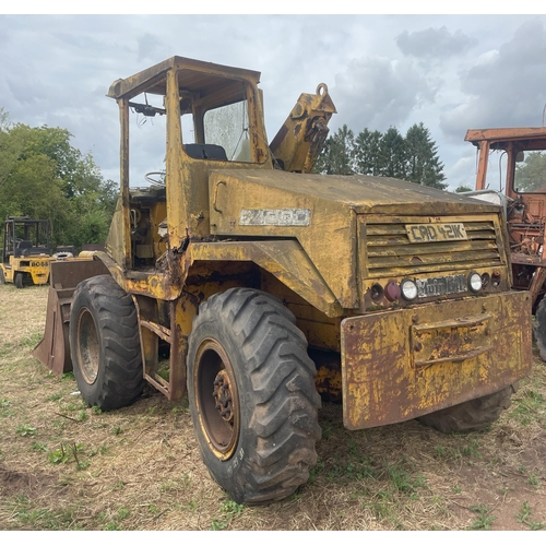 279 - Muir Hill B4000 loading shovel with bucket. Reg. CAD 421K. Old V5 in office