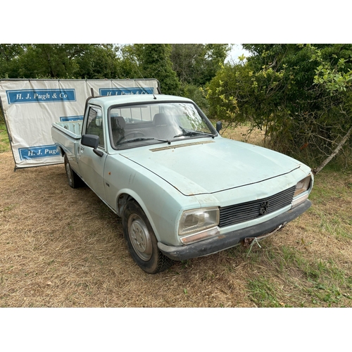 166 - Peugeot 504 pickup, farm use, runs and drives, showing 48476 miles Reg. E31 LAD