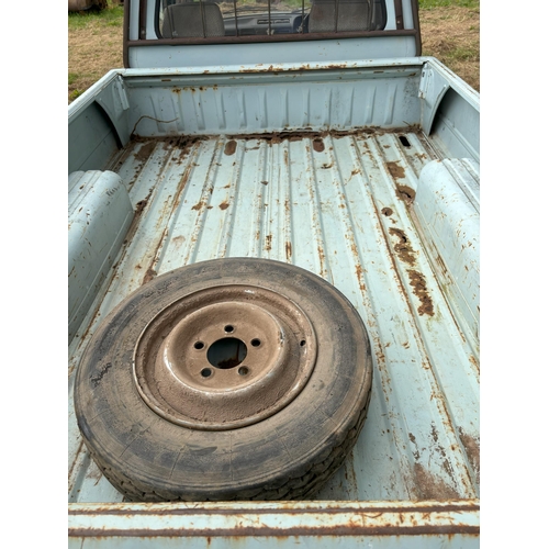 166 - Peugeot 504 pickup, farm use, runs and drives, showing 48476 miles Reg. E31 LAD