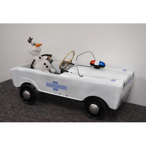 49 - Childs police pedal car