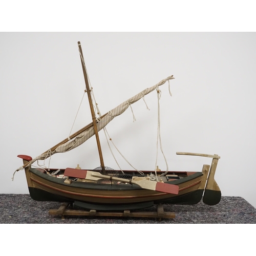 12 - Wooden model sailing boat on stand 32