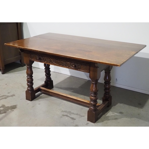 532 - Oak hall table with carved drawer and drop leaf back H28½