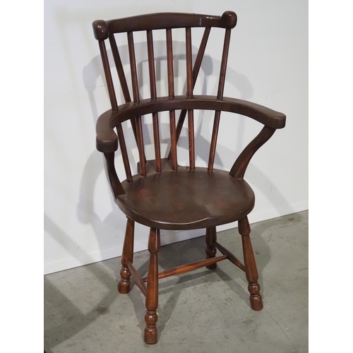 526 - Hardwood stick back armchair