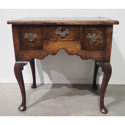 518 - 18th Century oak lowboy consisting of 3 drawers with brass handles sat on cabriole legs H26